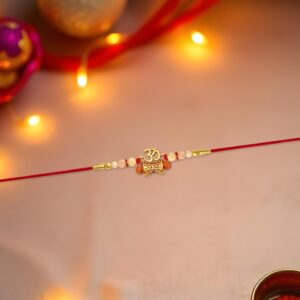 Elegant Golden Charm Rakhi with Pearl Beads and Red Thread – Traditional Raksha Bandhan Bracelet for Brother