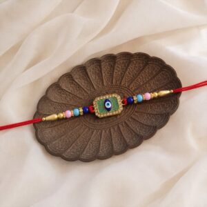 Stylish Evil Eye Rakhi with Mint Green Thread (1 Pc)