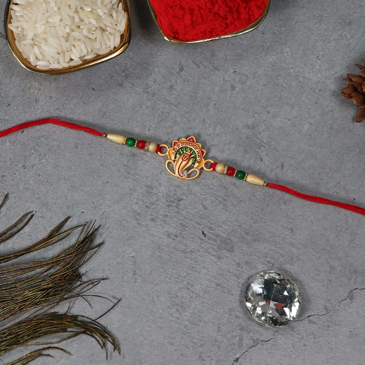 Sacred Om Ganesha Rakhi with Traditional Beadwork