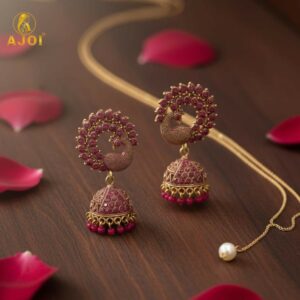Peacock Motif Ruby-Tone Jhumka Earrings in Antique Gold Finish