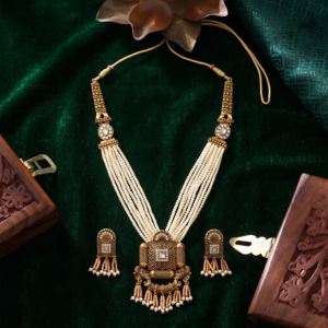 Royal Gold and Pearl Necklace Set with Detailed Pendant and Earrings for Traditional Wear