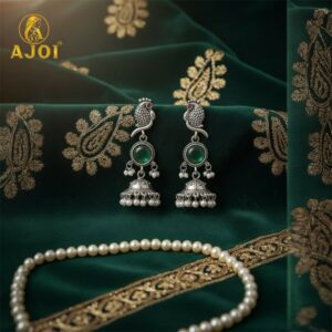 Handcrafted Antique Silver Peacock Jhumka Earrings with Emerald Green Stone & Pearl Drop Detailing