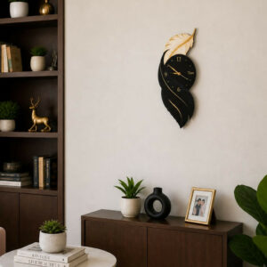 Modern Leaf Design Wall Clock with Black and Gold Accents for Stylish Home Decor (15x7 Inch)