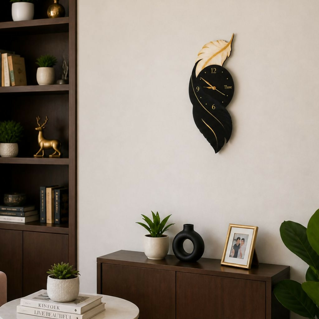 Modern Leaf Design Wall Clock with Black and Gold Accents for Stylish Home Decor (15x7 Inch)