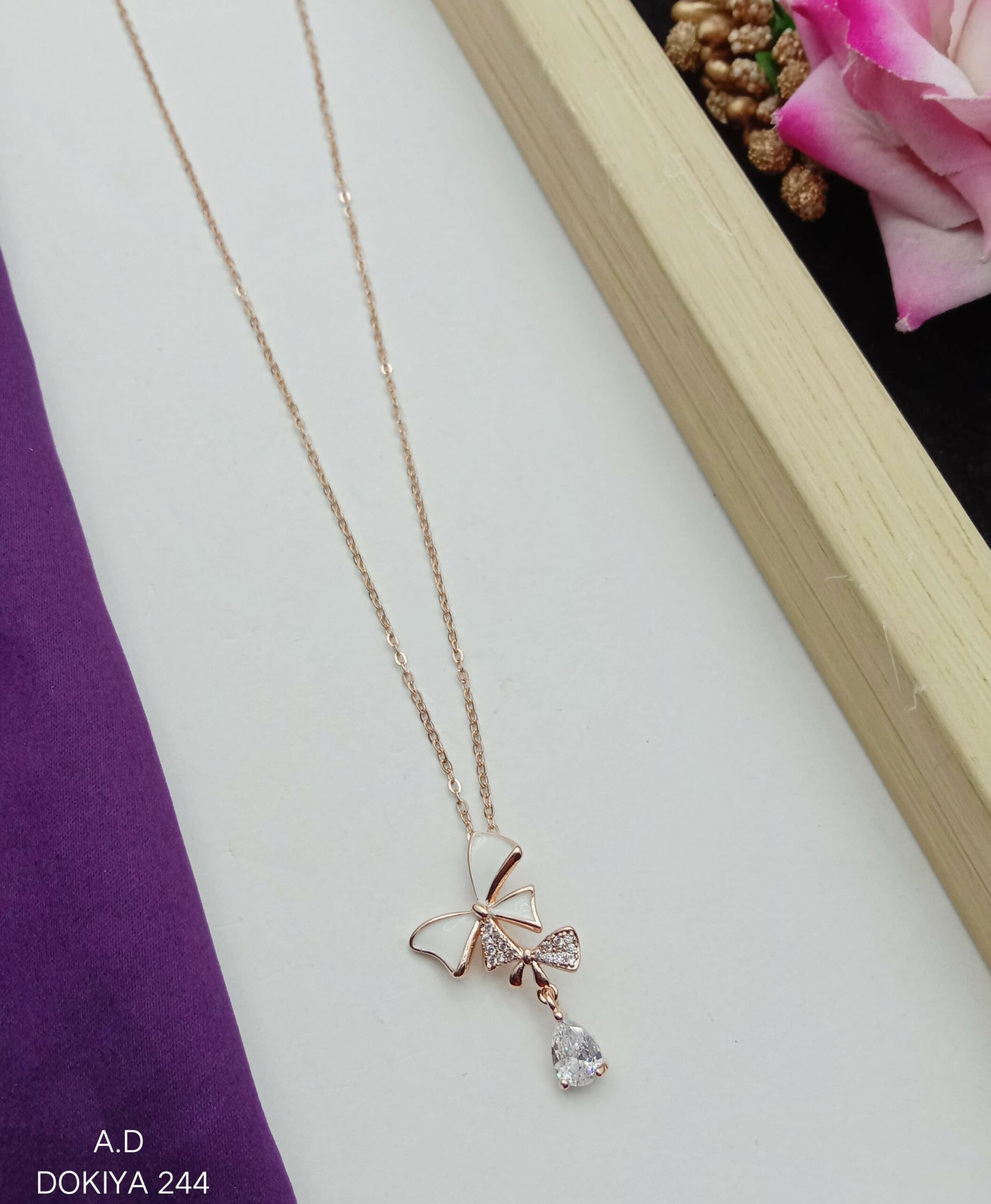 Rose Gold Layered Ribbon Pendant And Chain