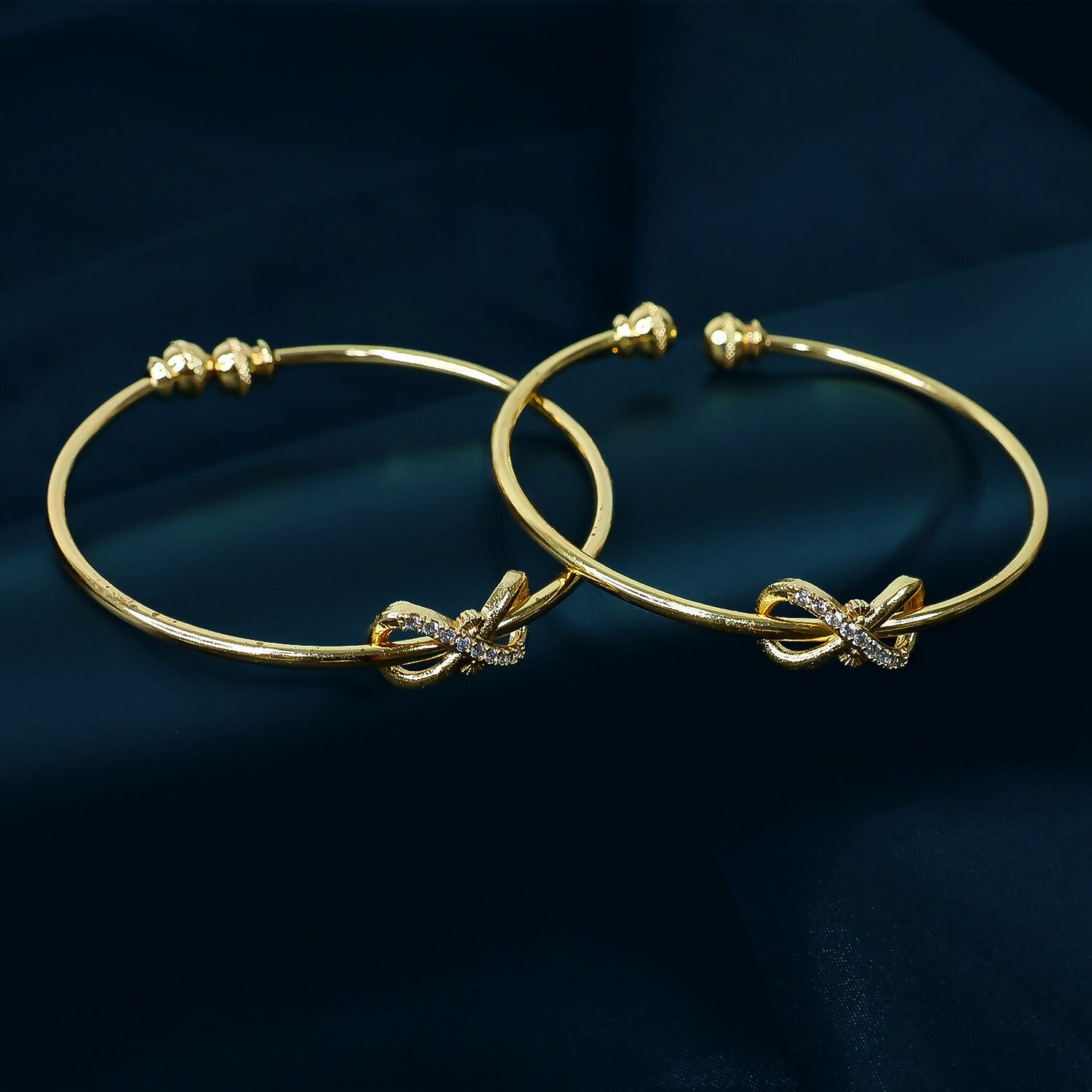 Elegant Knot Design Bangles with Stone Detailing