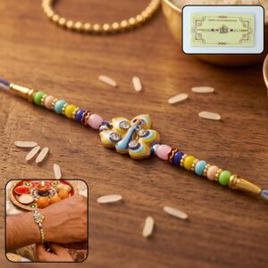 Stylized Peacock Feather Golden Swirl Rakhi