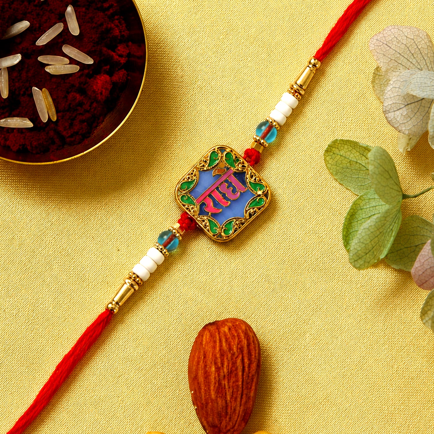 Rakhi with "Radhe" Engraved and Colorful Beads (1 Pc)