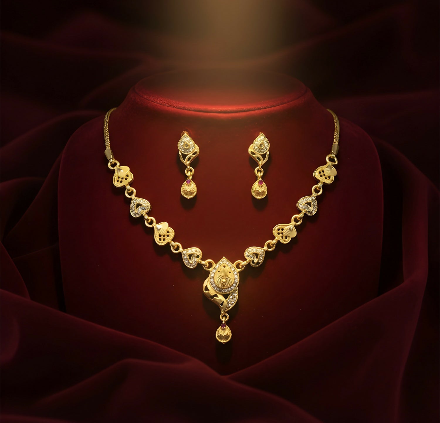 Elegant Gold-Tone Heart Motif Necklace Set with Designer Pendant & Matching Drop Earrings