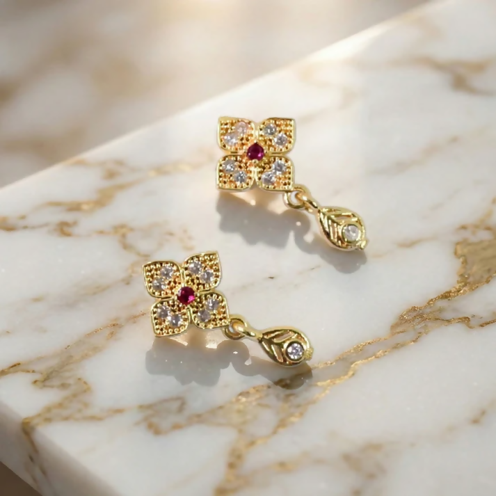 Charming Flower Motif Gold Earrings with Teardrop Charm