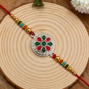 Silver Plated Floral Rakhi with Red & Green Stones