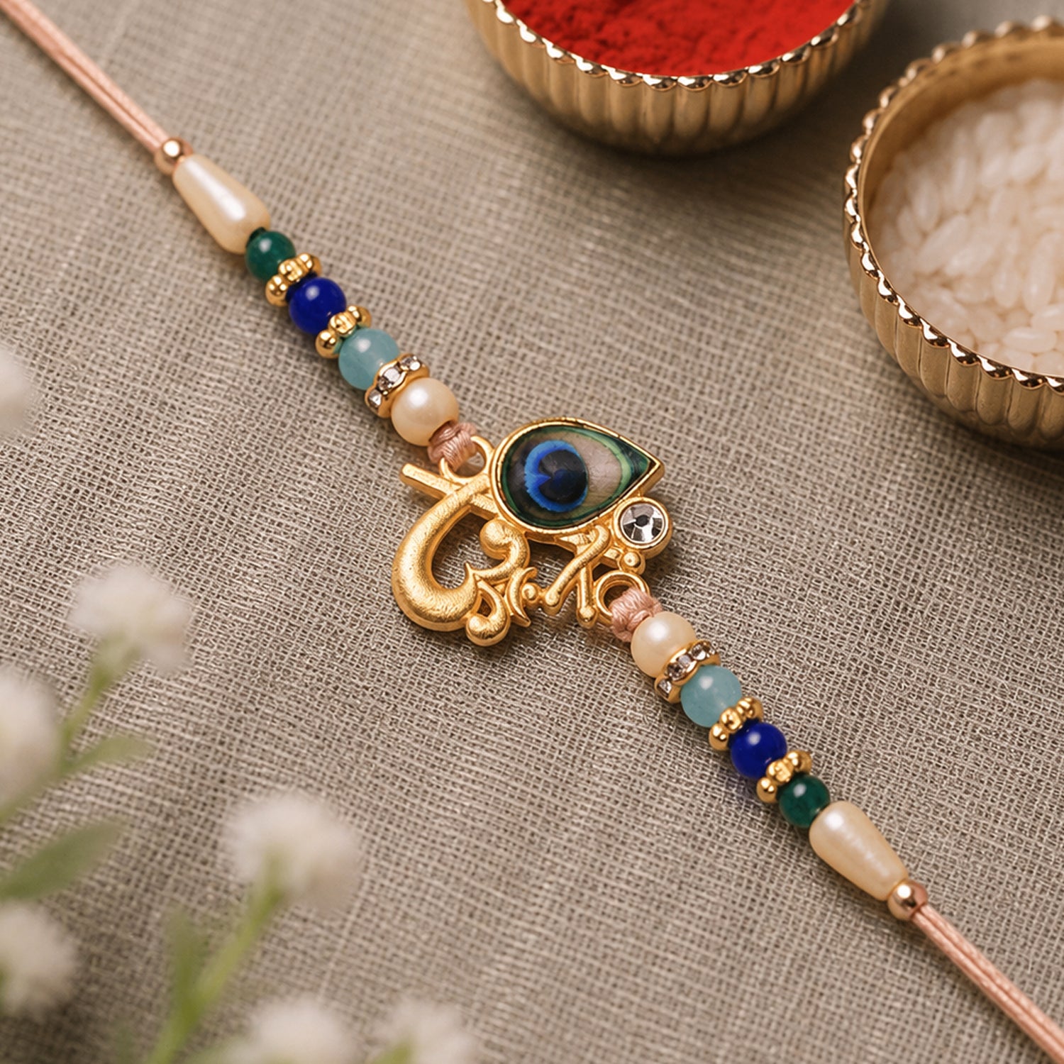 Divine Govind Rakhi with Peacock Feather Design and Multicolor Beads