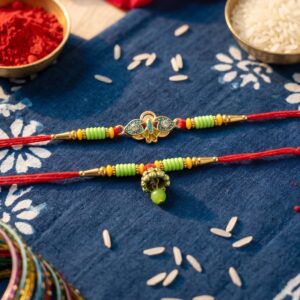 Om Peacock Bhabhi Rakhi with Multicolor Beads